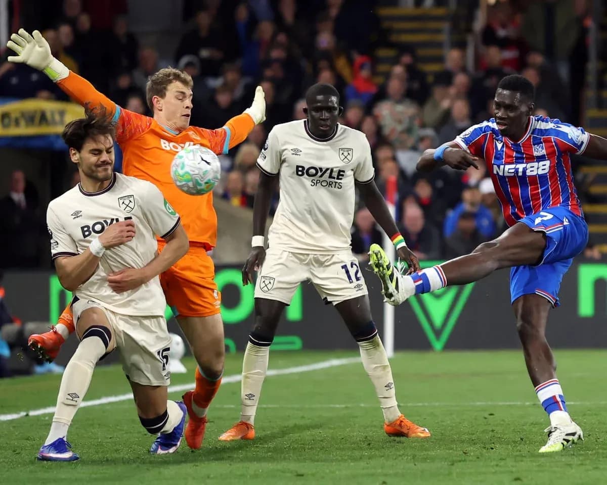 Crystal Palace player kicking the ball against West Ham