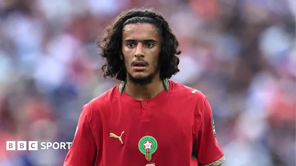 Moroccan player in red jersey during match