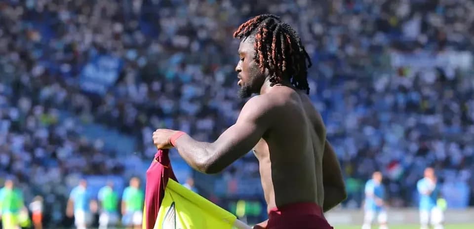 Player removing jersey on the field during match