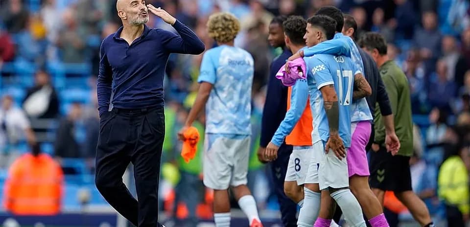 Manchester City players celebrating after match