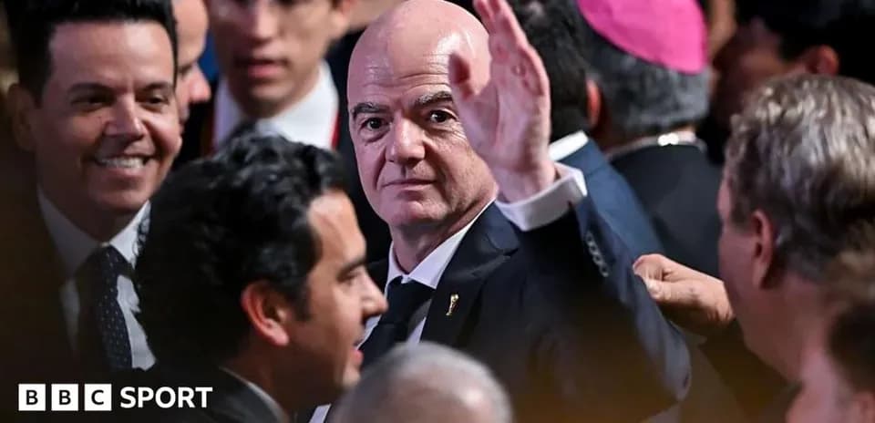Gianni Infantino waving at an event gathering