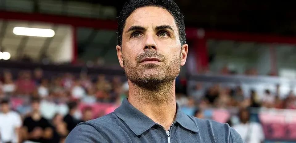 Manager observing from the sidelines during match