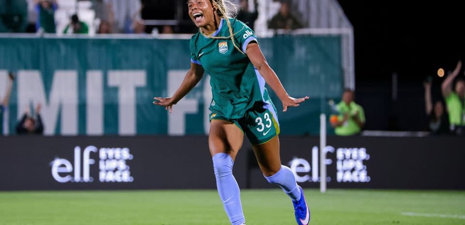 Player celebrating a goal during a soccer match