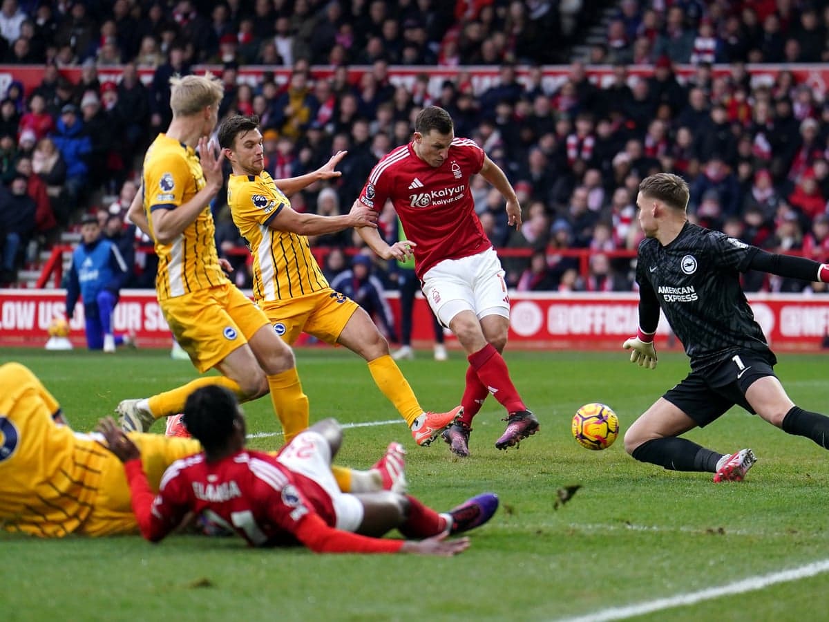 Brighton players contesting ball against Nottingham Forest