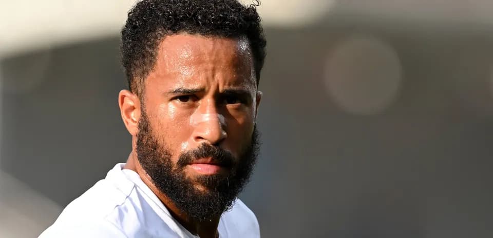 Player with beard and bandage during training session