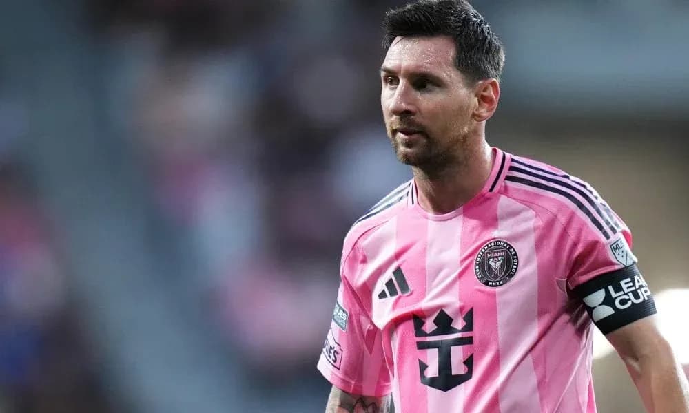 Lionel Messi in pink Inter Miami jersey on field