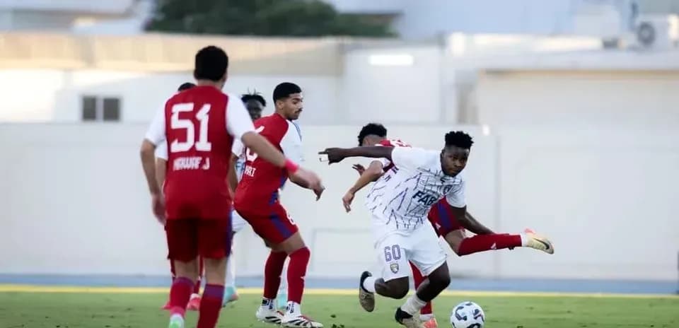 Al Ain U23 player dribbling past opponents
