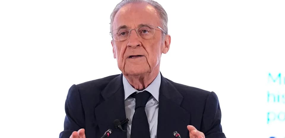 Man speaking at a podium during press conference
