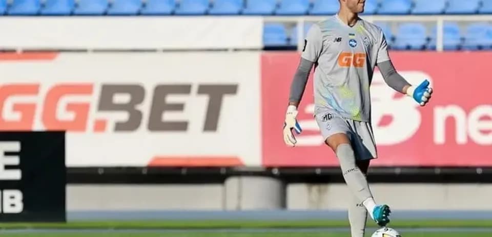 Goalkeeper in training with ball at feet