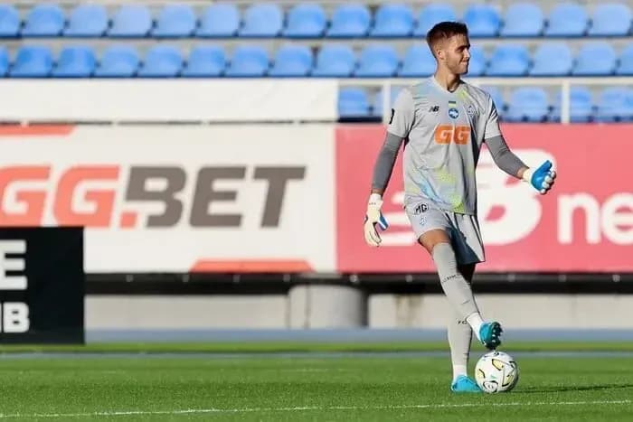 Goalkeeper in training with ball at feet