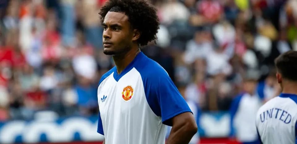 Player in Manchester United training kit during warm-up