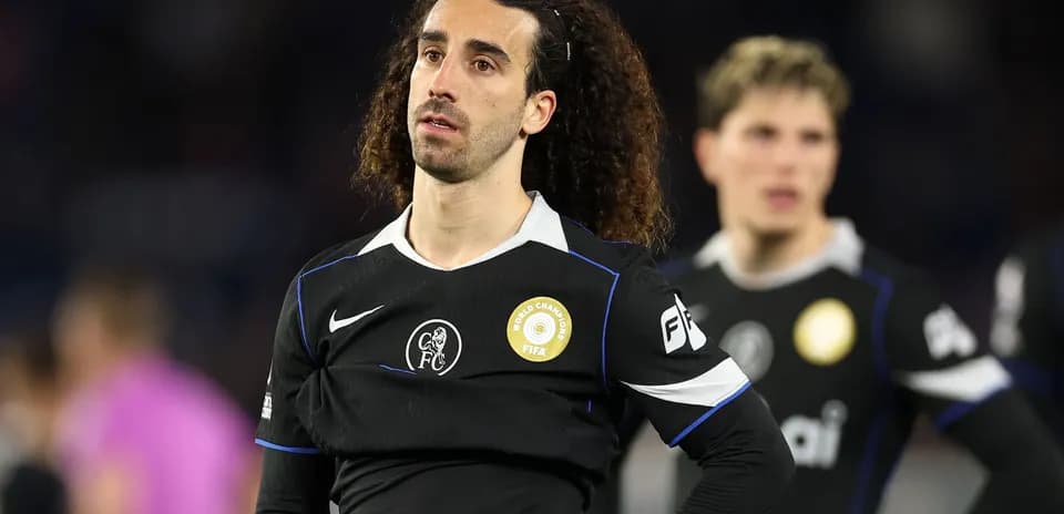 Player in black jersey during match with teammates