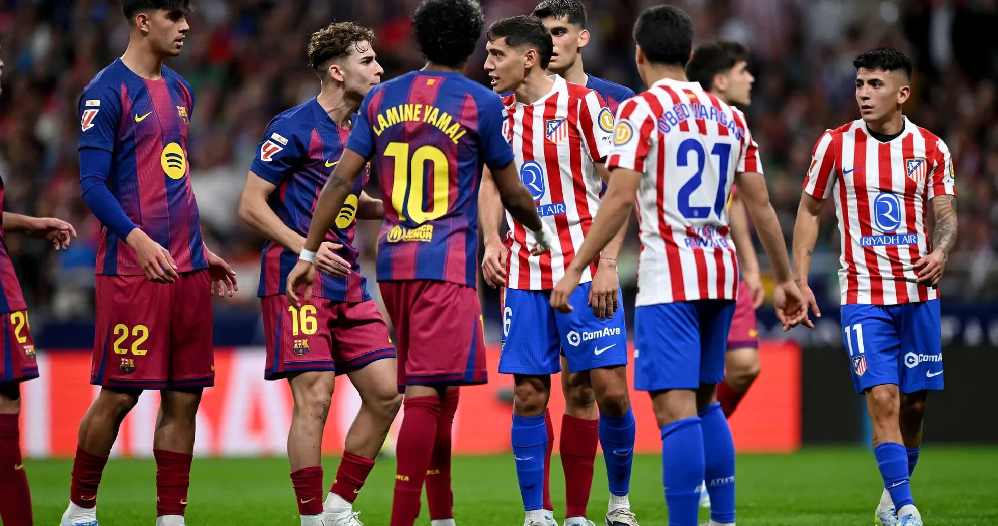 Barcelona and Atletico Madrid players in confrontation