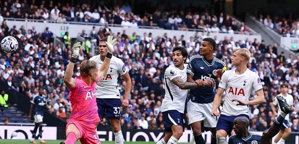 Goalkeeper saving a shot during Tottenham match