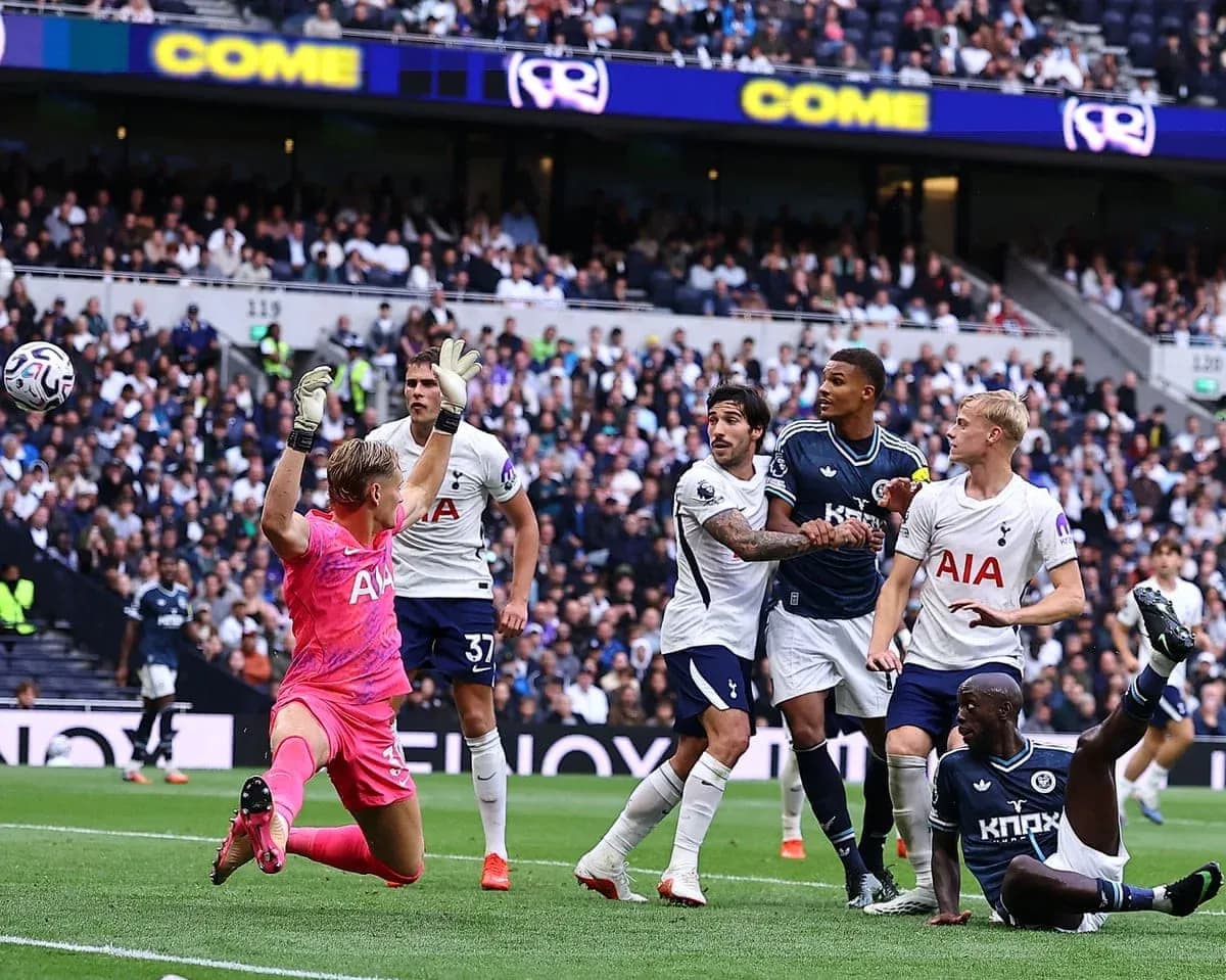 Goalkeeper saving a shot during Tottenham match