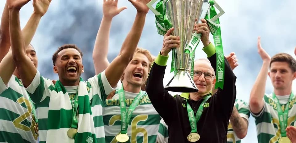 Team celebrating with trophy after championship victory