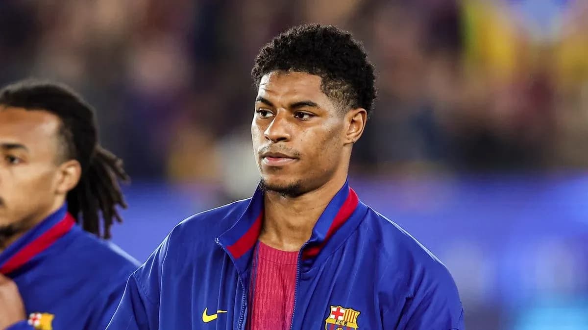 Player in FC Barcelona jacket during match warm-up