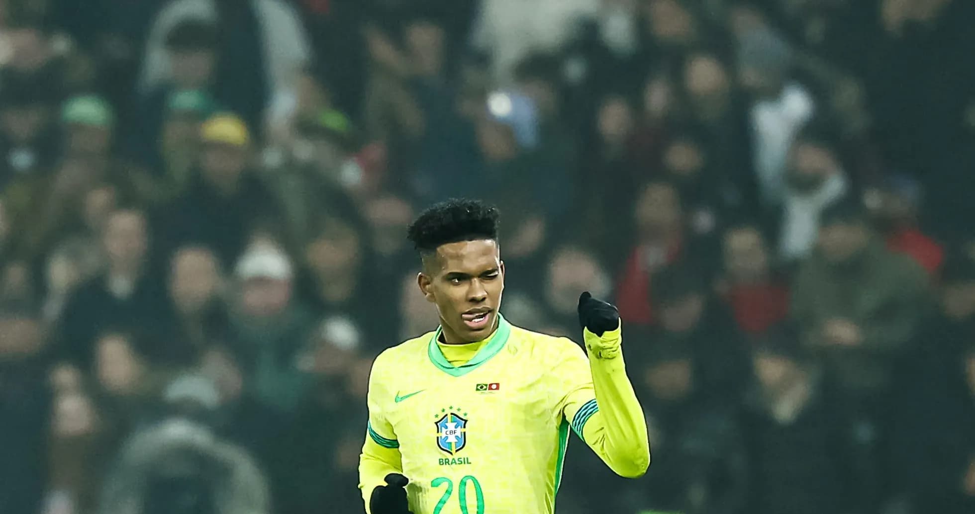 Player celebrating in Brazil national team jersey