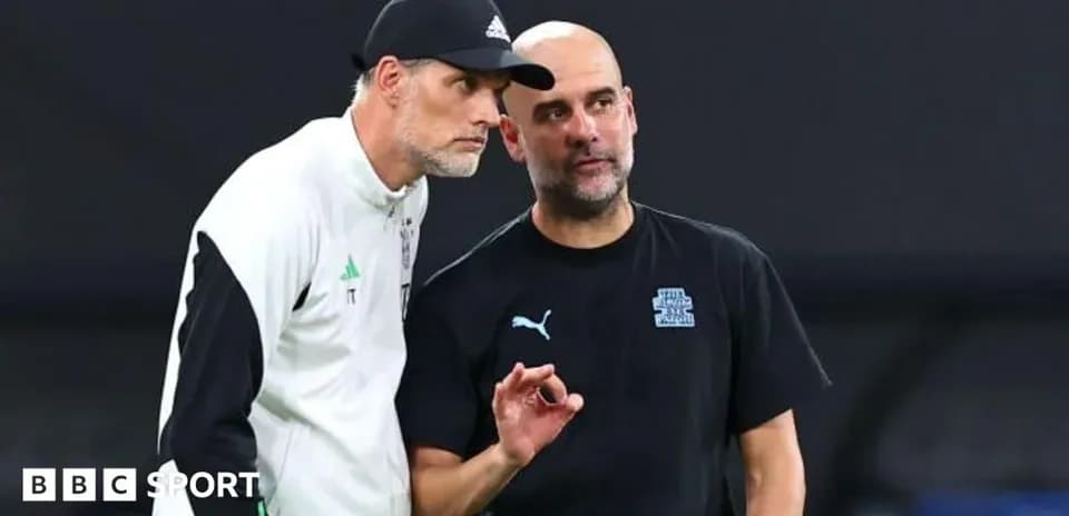 Two coaches discussing strategy during match preparation