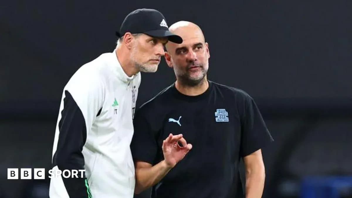 Two coaches discussing strategy during match preparation
