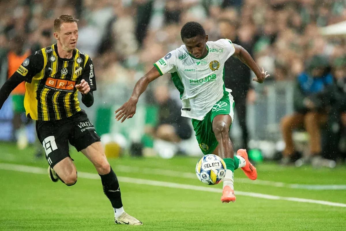Player dribbling the ball past opponent during match