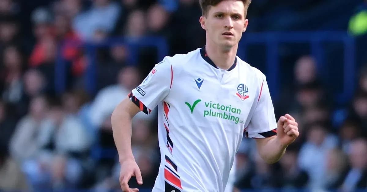 Bolton Wanderers player running on the field