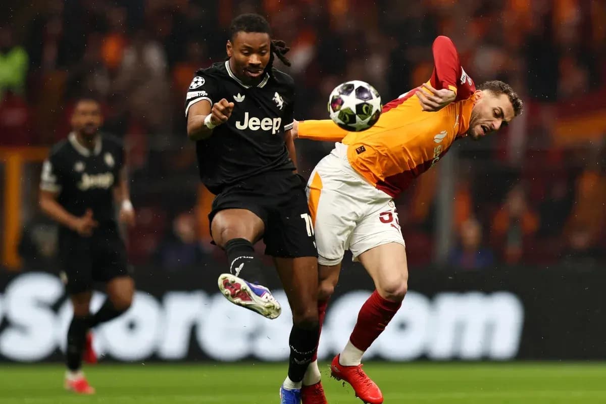 Players contesting for the ball during football match