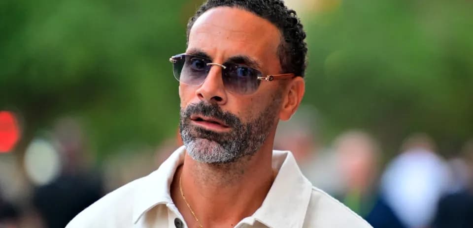 Man wearing sunglasses with a neutral expression