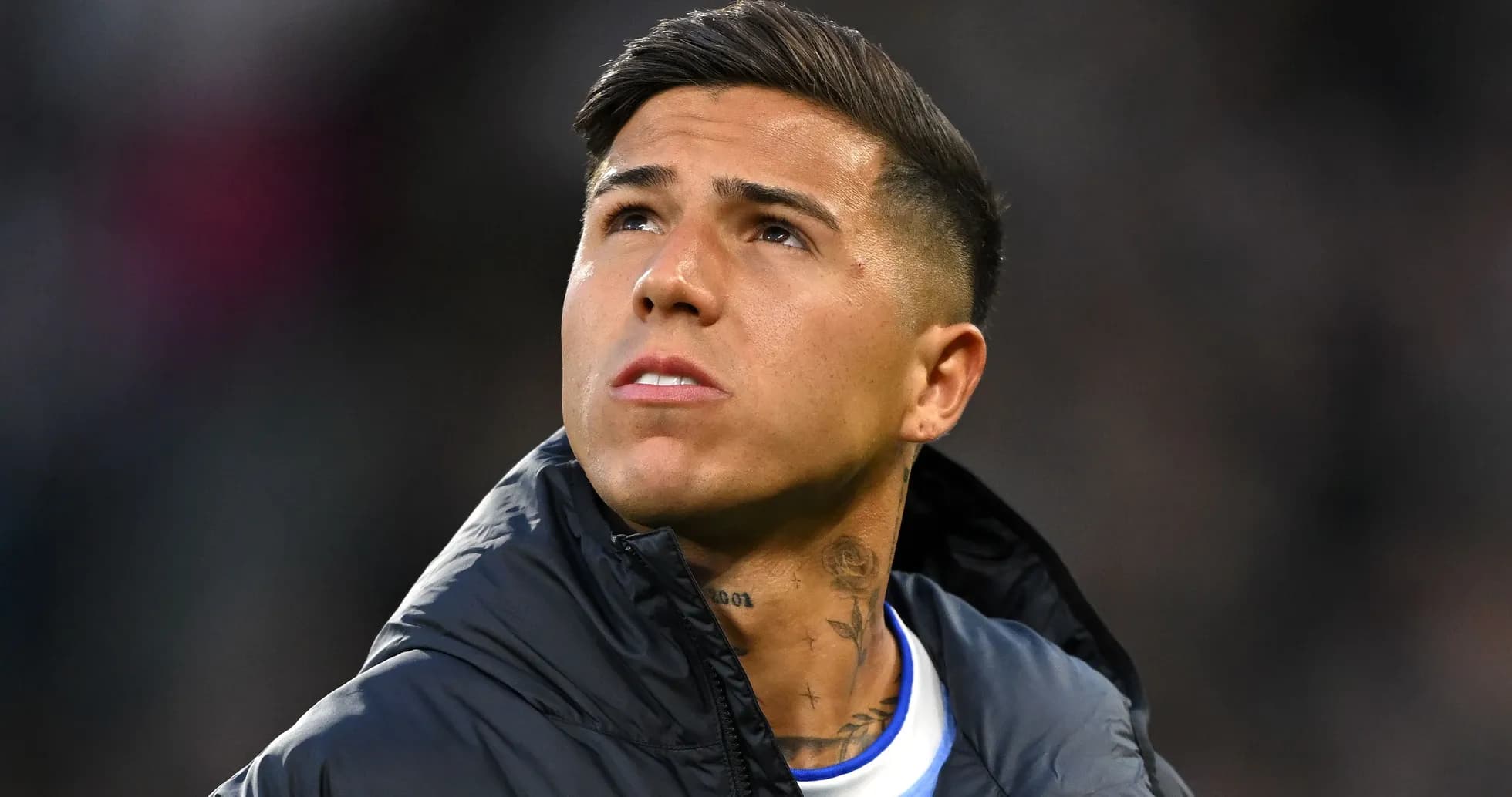 Player looking up while wearing a jacket