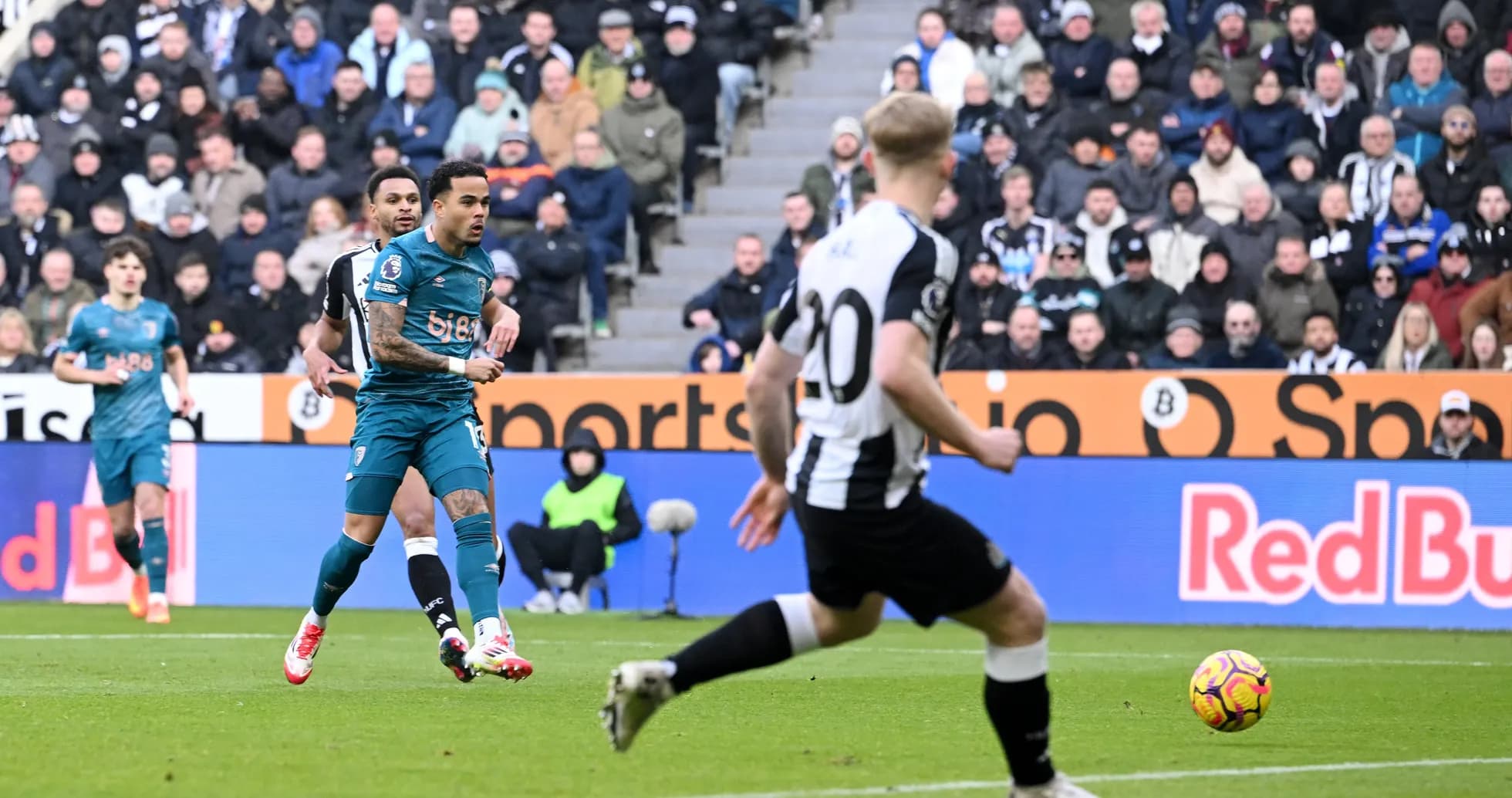 Bournemouth player passing the ball against Newcastle