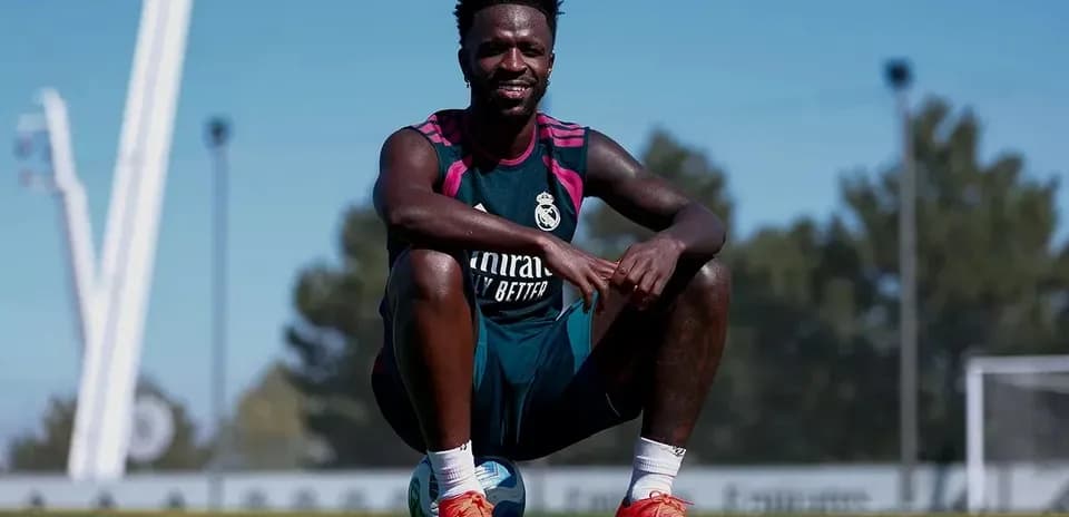 Player sitting on ball during training session