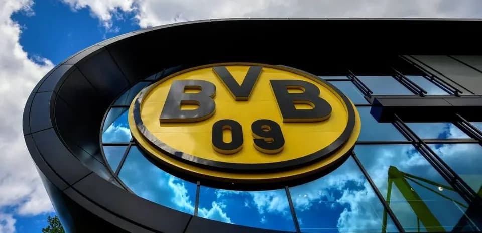 BVB 09 logo on building with cloudy sky