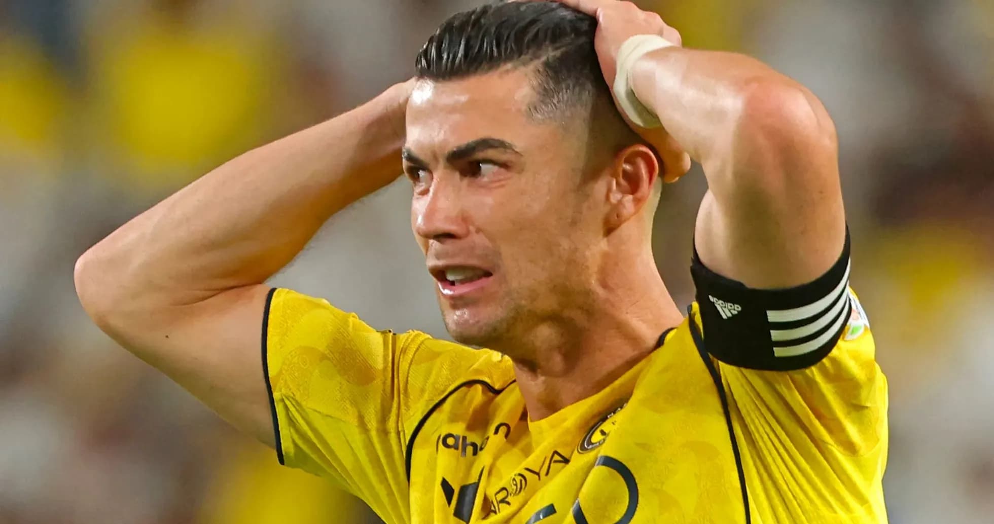 Player with hands on head during match