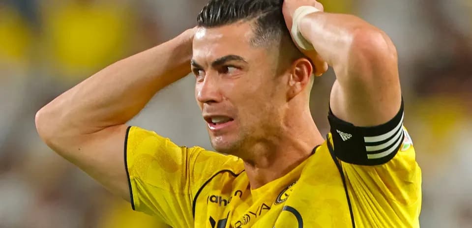 Player with hands on head during match