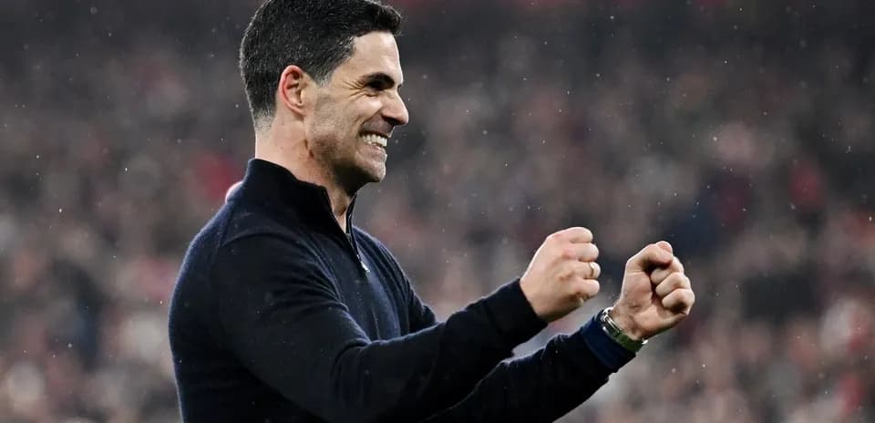 Manager celebrating victory with clenched fists