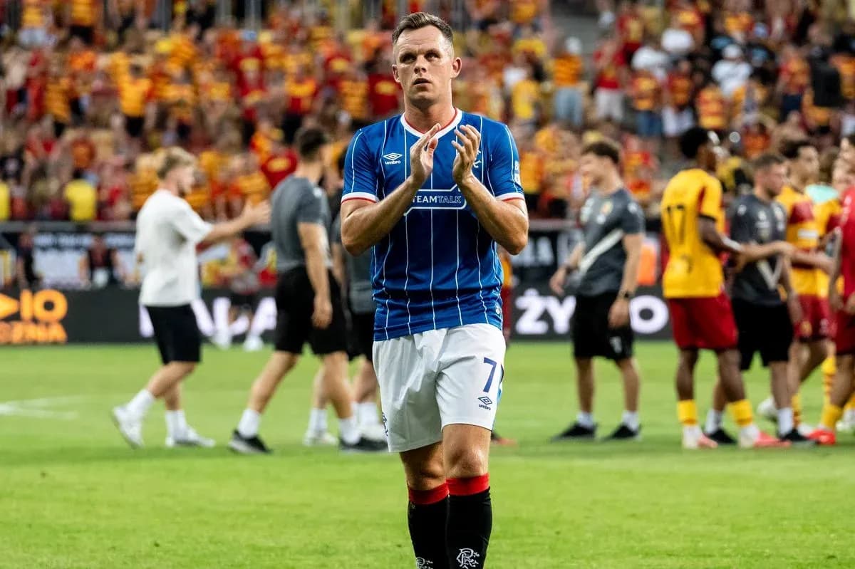 Rangers player applauding fans after the match