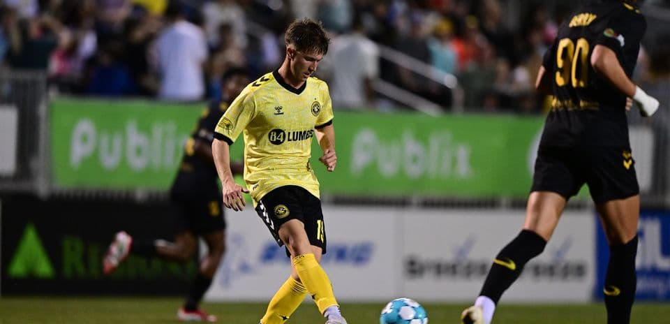Player dribbling ball during Charleston Battery match