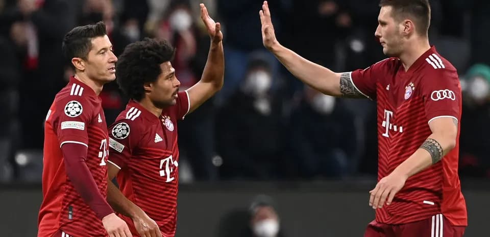 Bayern Munich players celebrating a goal together