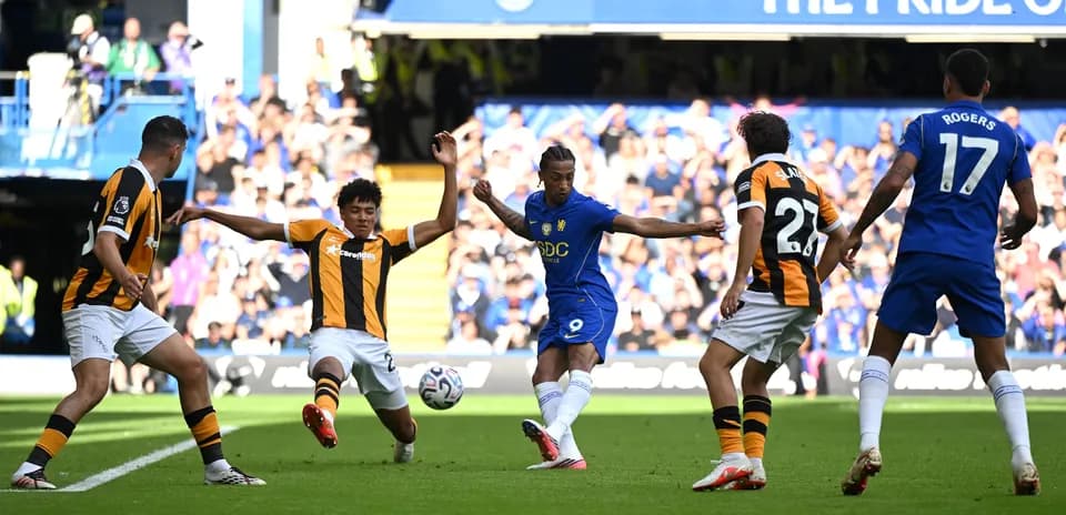 Chelsea player attempting to shoot against Hull City