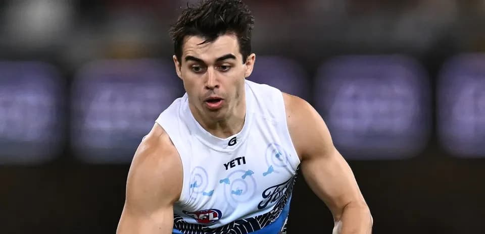 Player running during an Australian rules football match