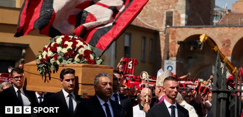 Funeral procession with coffin and mourners in city