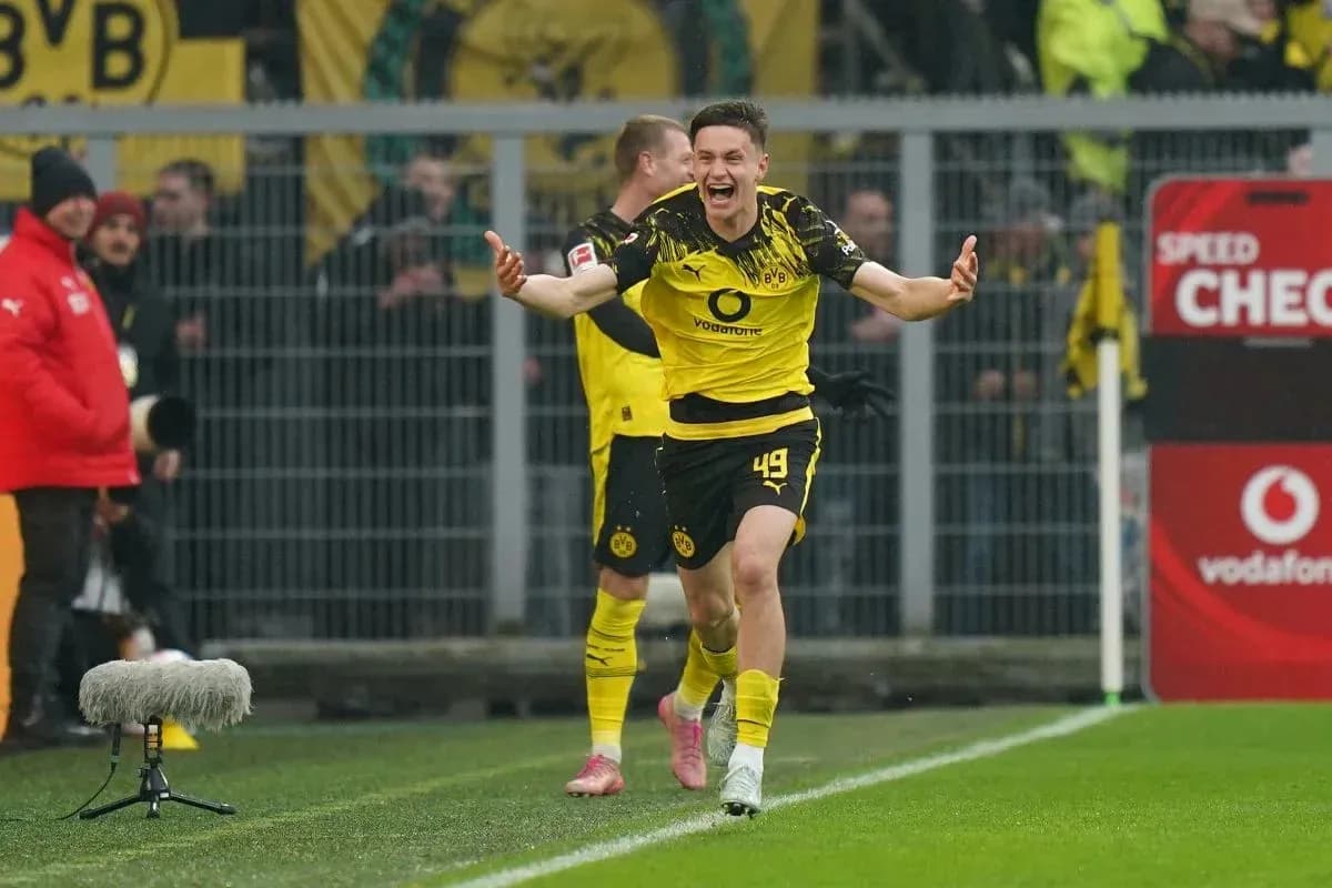 Player celebrating after scoring a goal for Borussia Dortmund