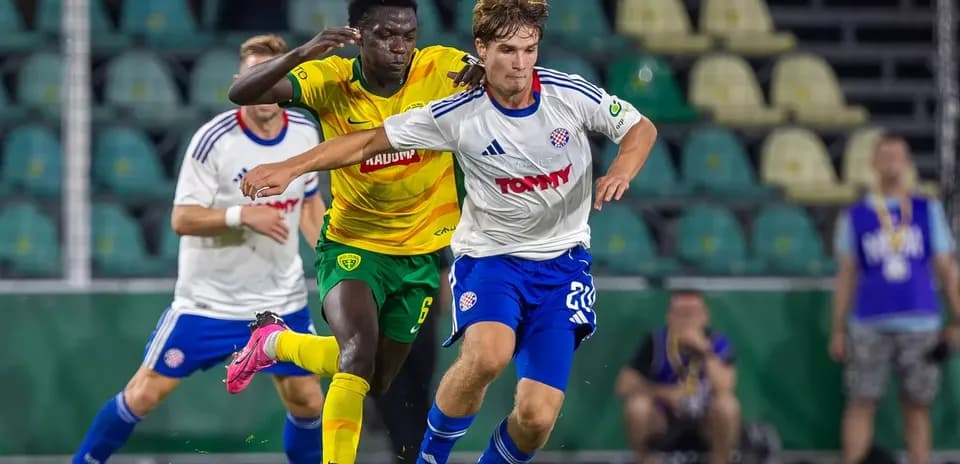 Player tackling during HNK Hajduk Split match