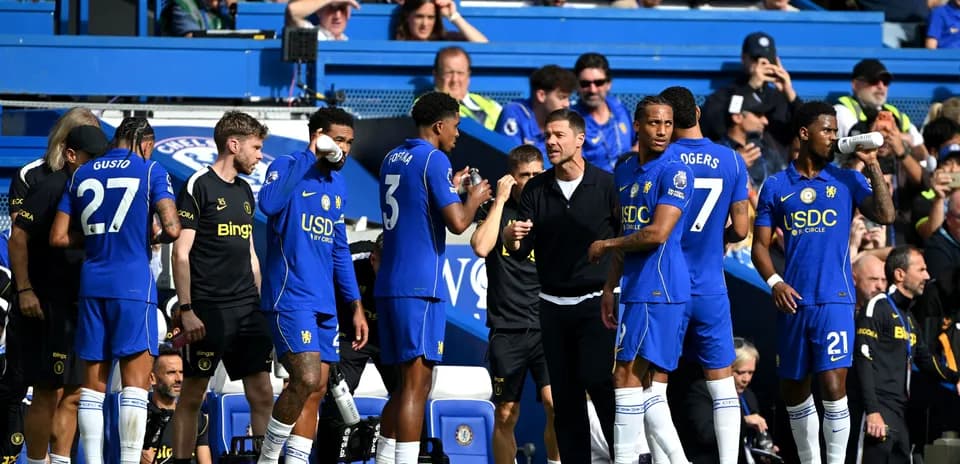 Chelsea players on bench during match against opponent