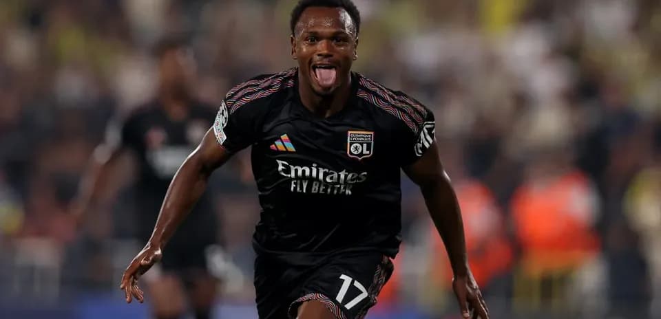 Lyon player celebrating goal during Champions League match