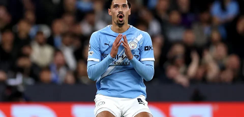 Player in light blue jersey reacting during match