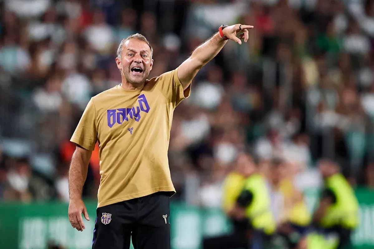 Coach directing players from the sideline during match