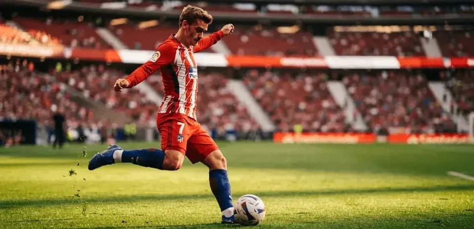 Player kicking ball on field during match