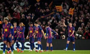 Barcelona players celebrating during a match