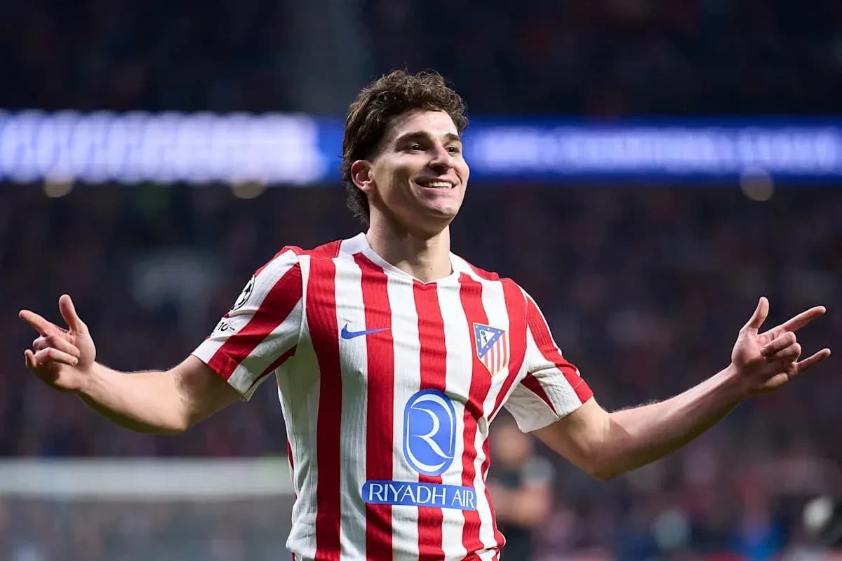 Player celebrating in Atlético Madrid jersey during match